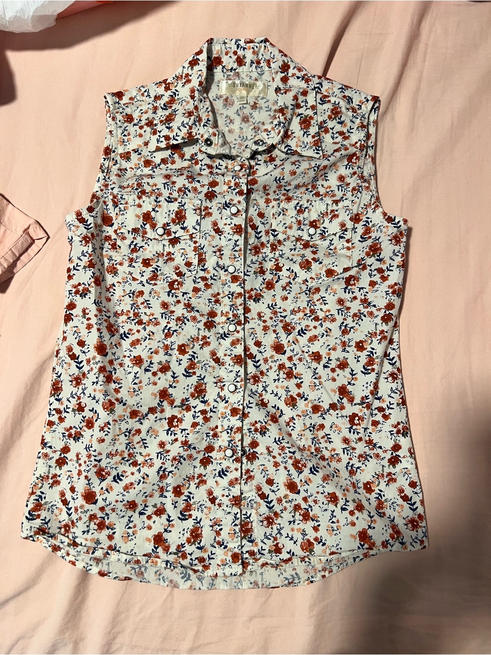 Shyanne White Sleeveless Button-Down Floral Blouse with Rust and Navy